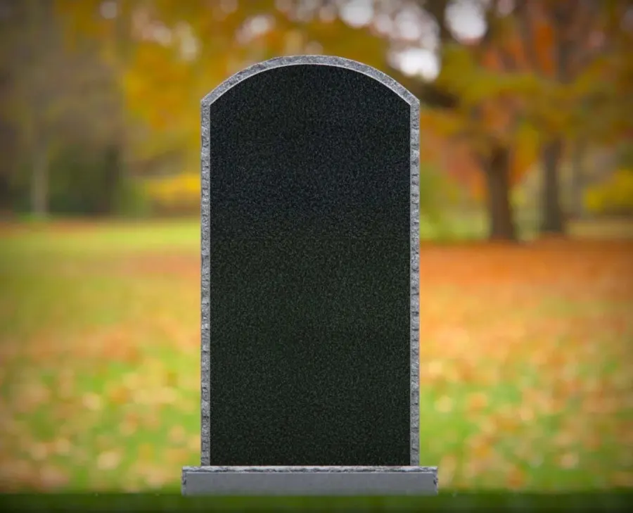 Single Upright Granite Headstone with Rock-Pitched Border